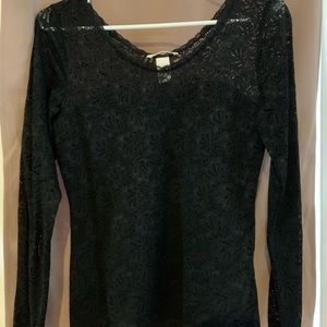 Black lace long sleeve shirt. It is new condition from H&M in a size small.